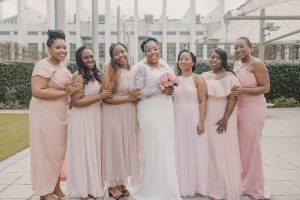 The African-Caribbean Wedding Photography London - Bridesmaids photo in pink and white dress